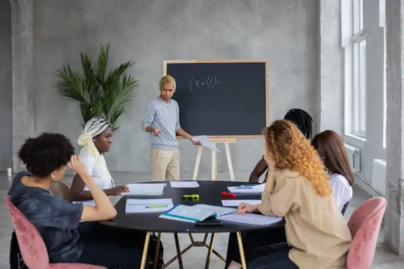 Student solving calculus problems on a whiteboard